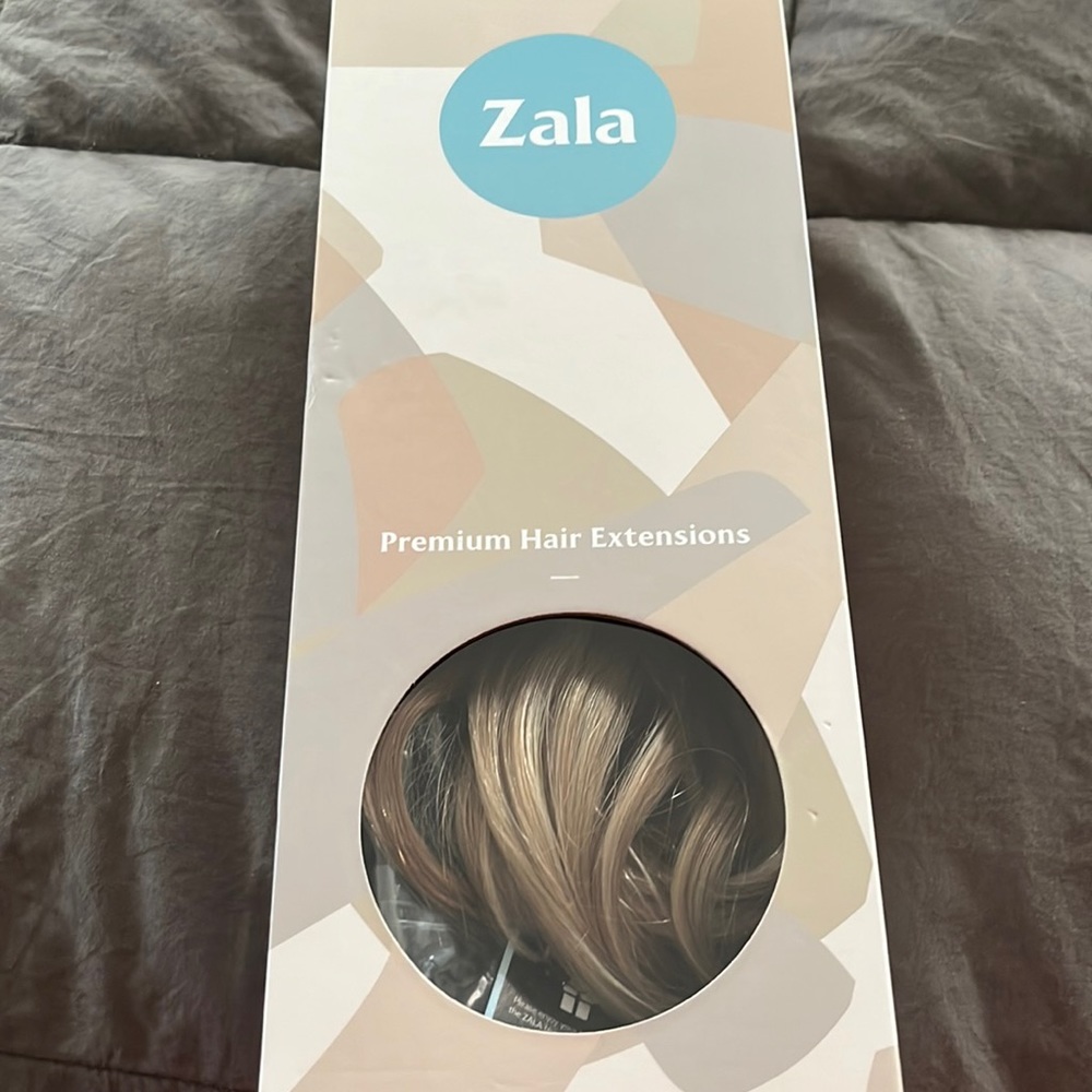 Zala clip in hair extensions medium length long layered.